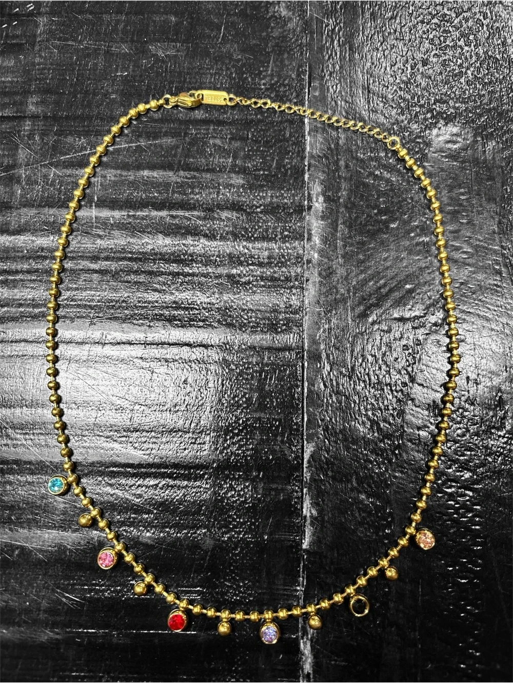 Gold Beaded Necklace with Multicolor Gemstone Charms